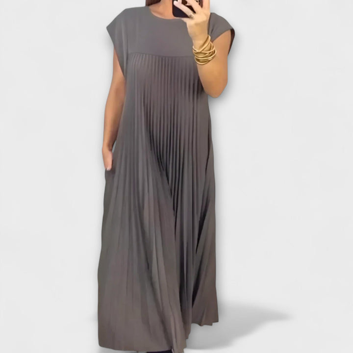 Zairelle – Elegantne Plisirane Obleke